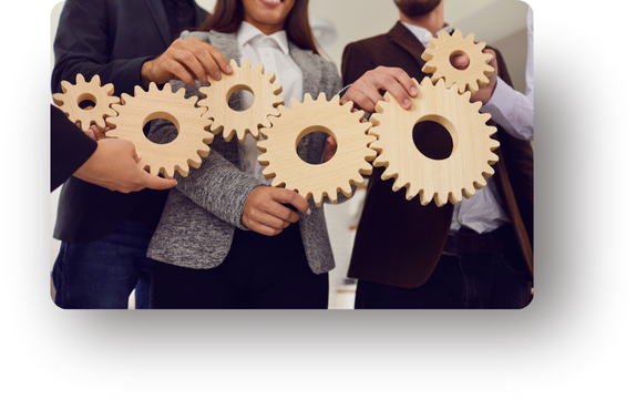 Group of people working together holder wooden gears